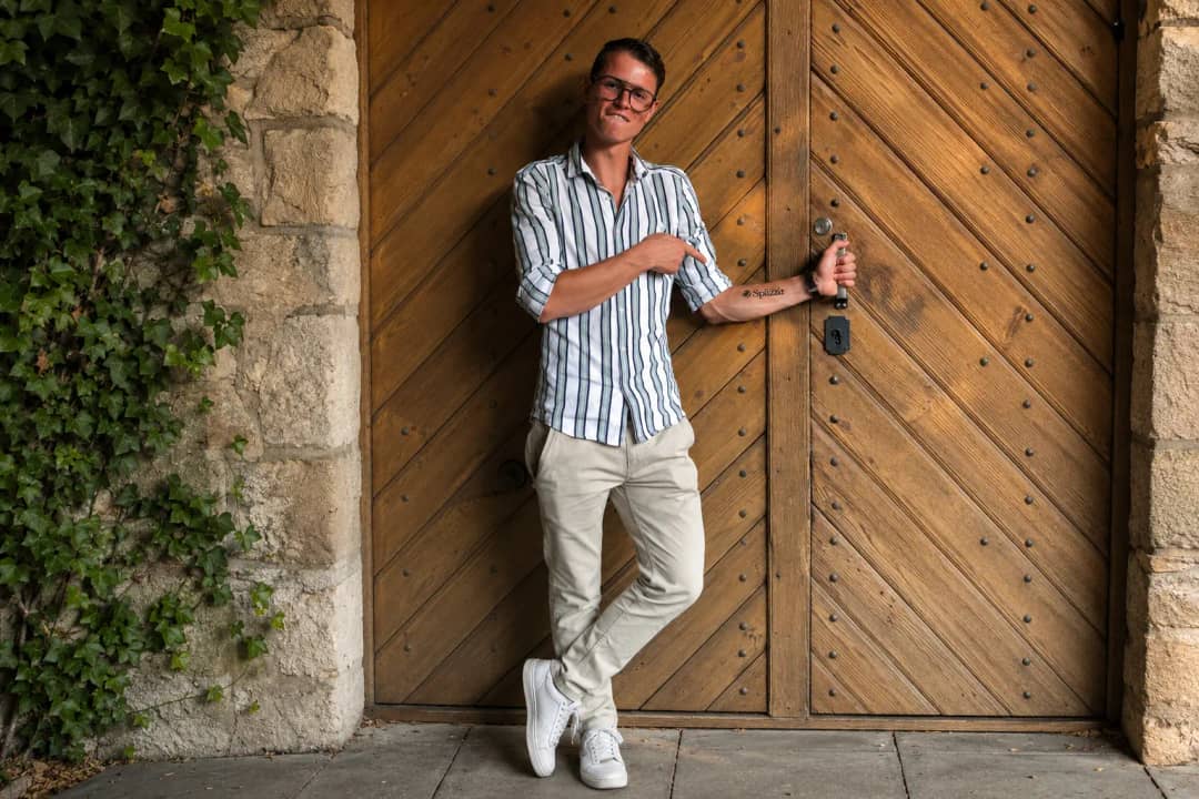 Sebastian Moser at the entrance to Alpine Weinkultur cooperative in Spiez, wine tour from Interlaken