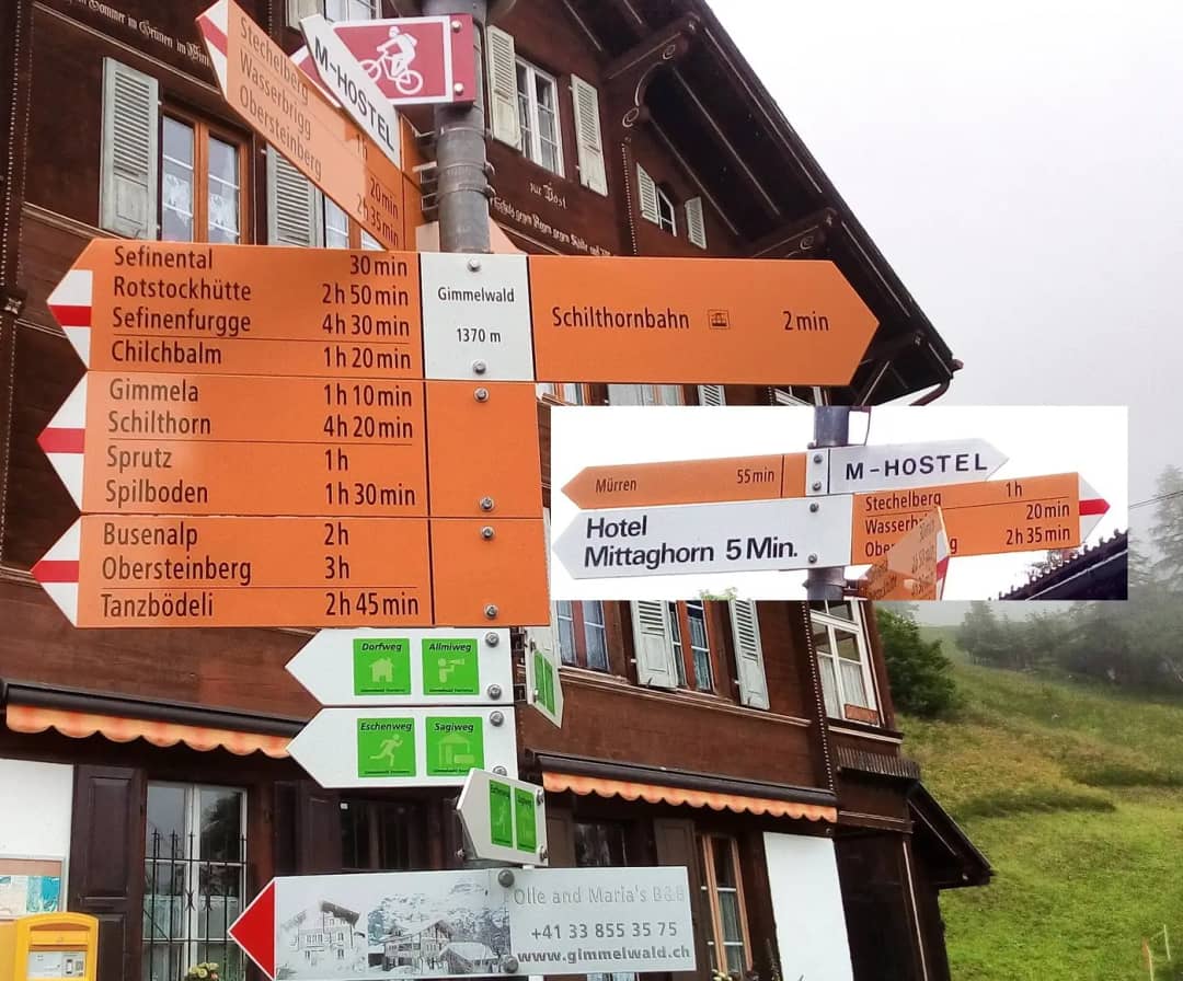 Panneau de randonnée à Gimmelwald, 1,370 m : cascade du Sprutz une heure, Mürren 55 minutes, Stechelberg 1h